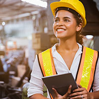 smiling female engineer looking at the roof