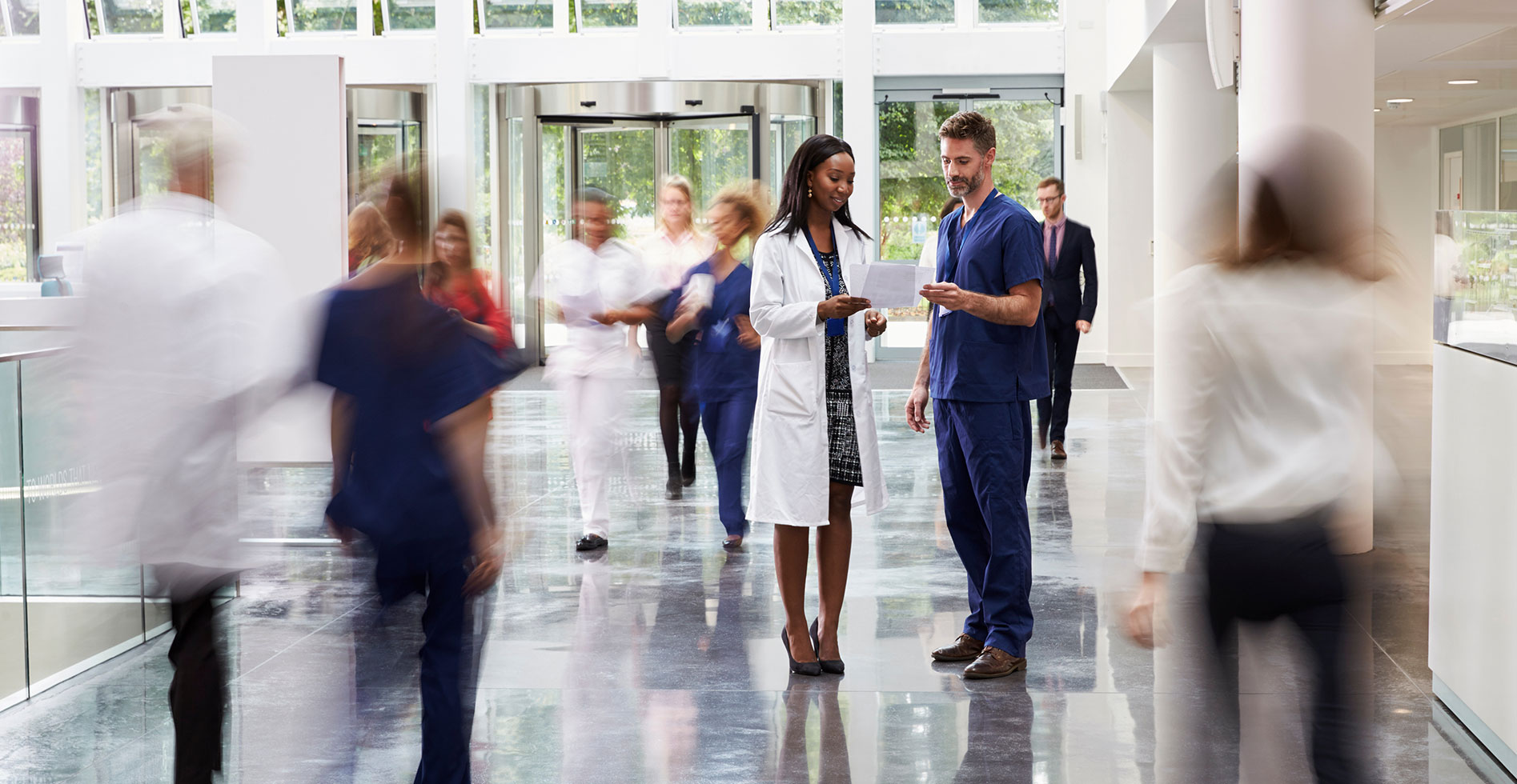 female doctor discussing test results with a nurse