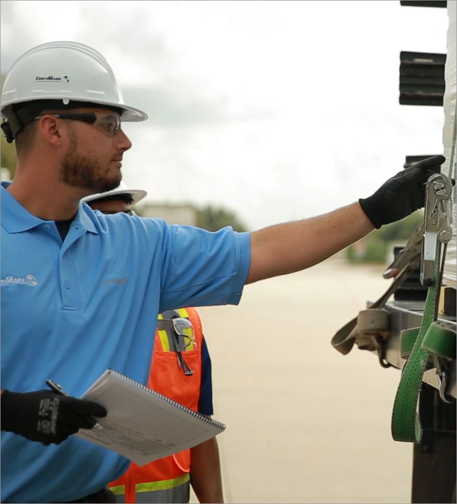 a centimark employee in hard hat checking a roof installation