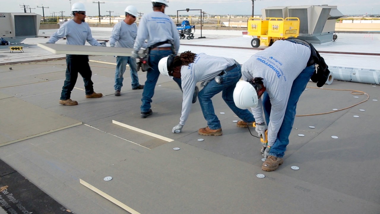 roof installers at work