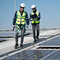 two engineers walking on roof